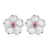 Boucles d'oreilles à bouton en forme de fleur avec zirconiums