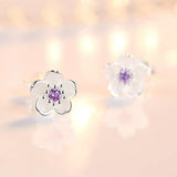 Boucles d'oreilles à bouton en forme de fleur avec zirconiums