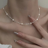 Collier élégant avec des perles lumineuses