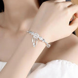 Bracelet avec pendentif attrape-rêves en argent
