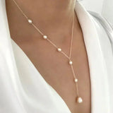 Collier vintage élégant avec pendentif et perles